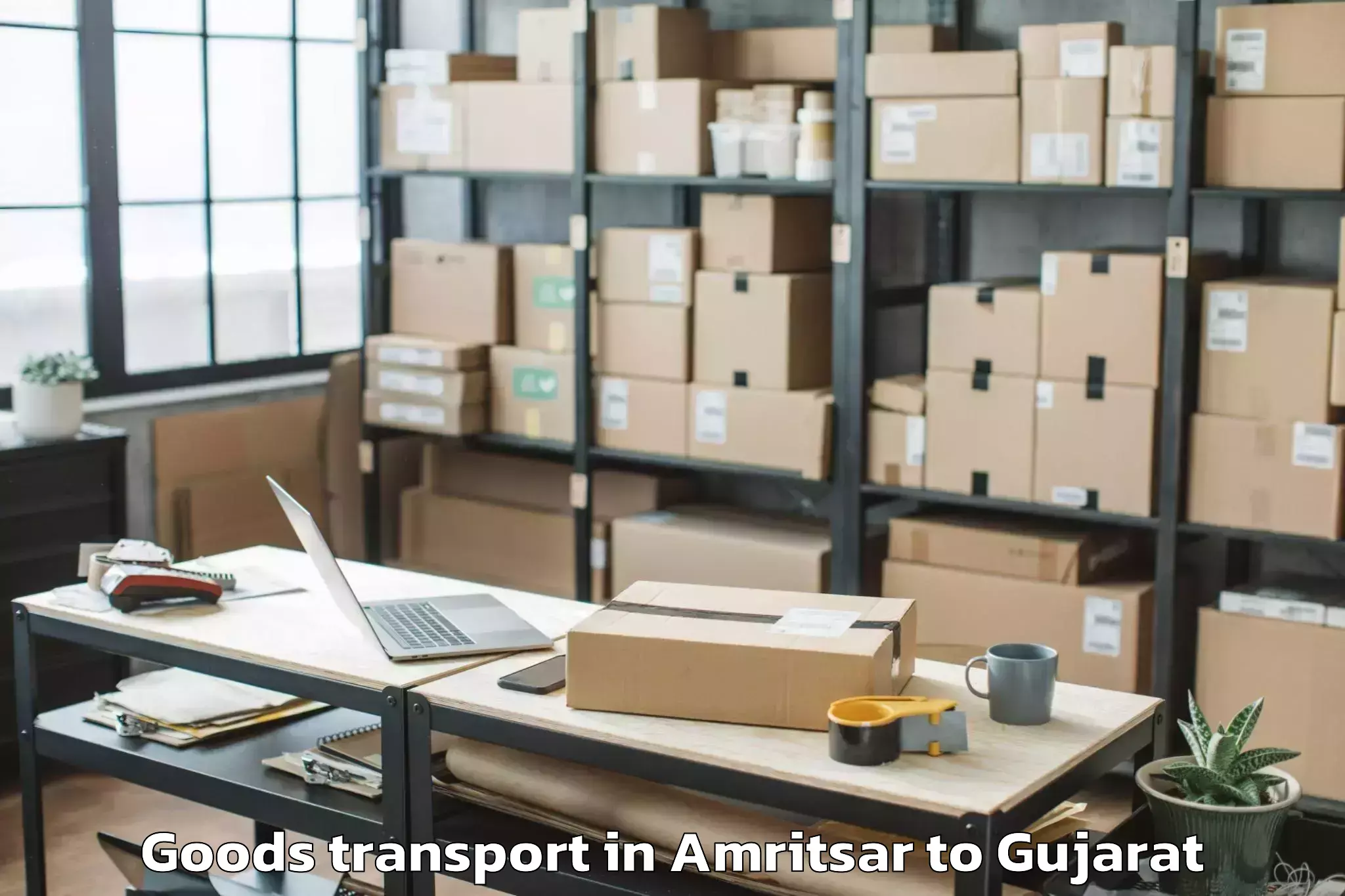 Book Amritsar to Bhiloda Goods Transport